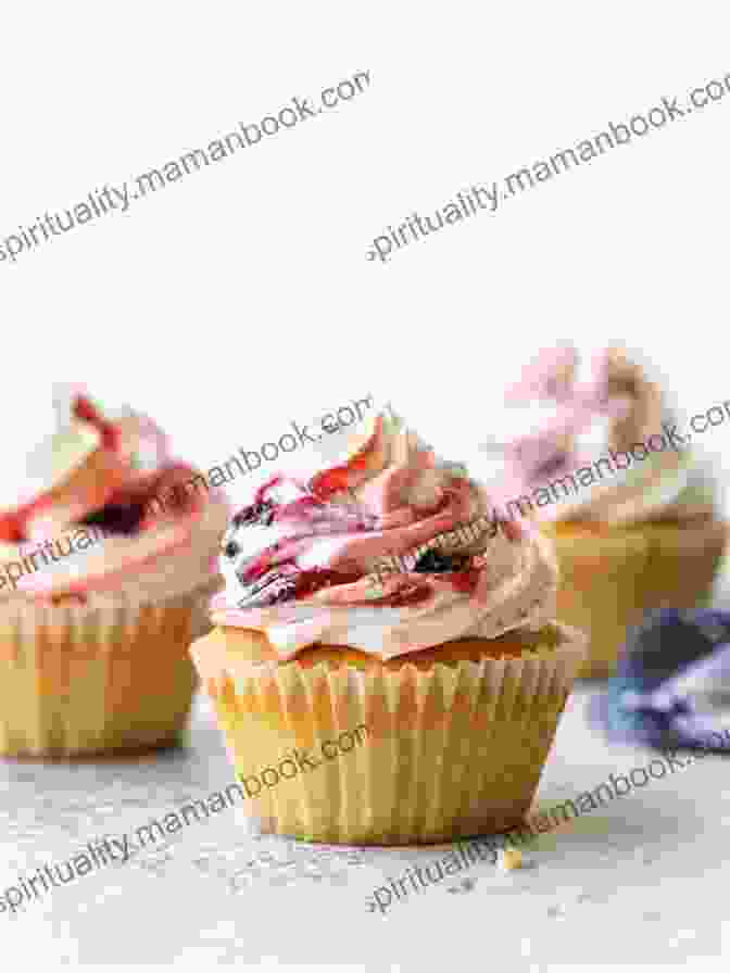 A Fluffy Vanilla Cupcake Swirled With Raspberry Jam And Topped With Vanilla Frosting Unforgettable Cupcake Cookbook 5: All Wonderful Cupcake Recipes To Satisfy Your Guts (The Best Ever Cupcake Recipe Collection)