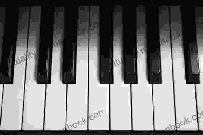 A Grand Piano Standing Alone On A Stage, Its Black And White Keys Inviting The Touch Of A Musician's Hands The Music Of Life: Bartolomeo Cristofori The Invention Of The Piano