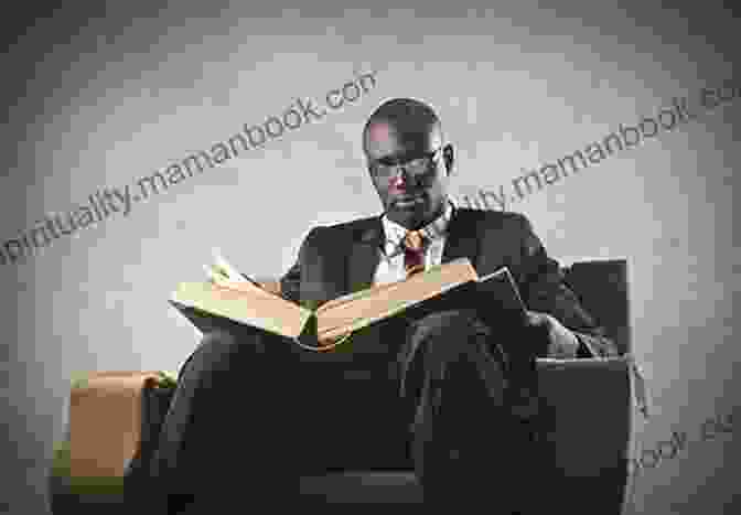 A Photograph Of A Black Man Reading A Book. Message To The Blackman In America