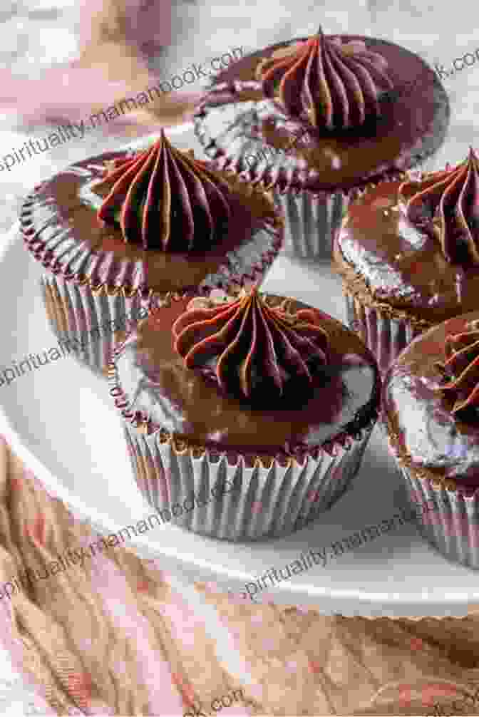 A Rich Chocolate Cupcake Topped With Chocolate Ganache Unforgettable Cupcake Cookbook 5: All Wonderful Cupcake Recipes To Satisfy Your Guts (The Best Ever Cupcake Recipe Collection)